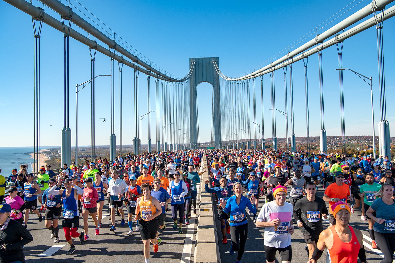 NYC Marathon 2025 spectators in Brooklyn, part of the two million crowd lining all five boroughs